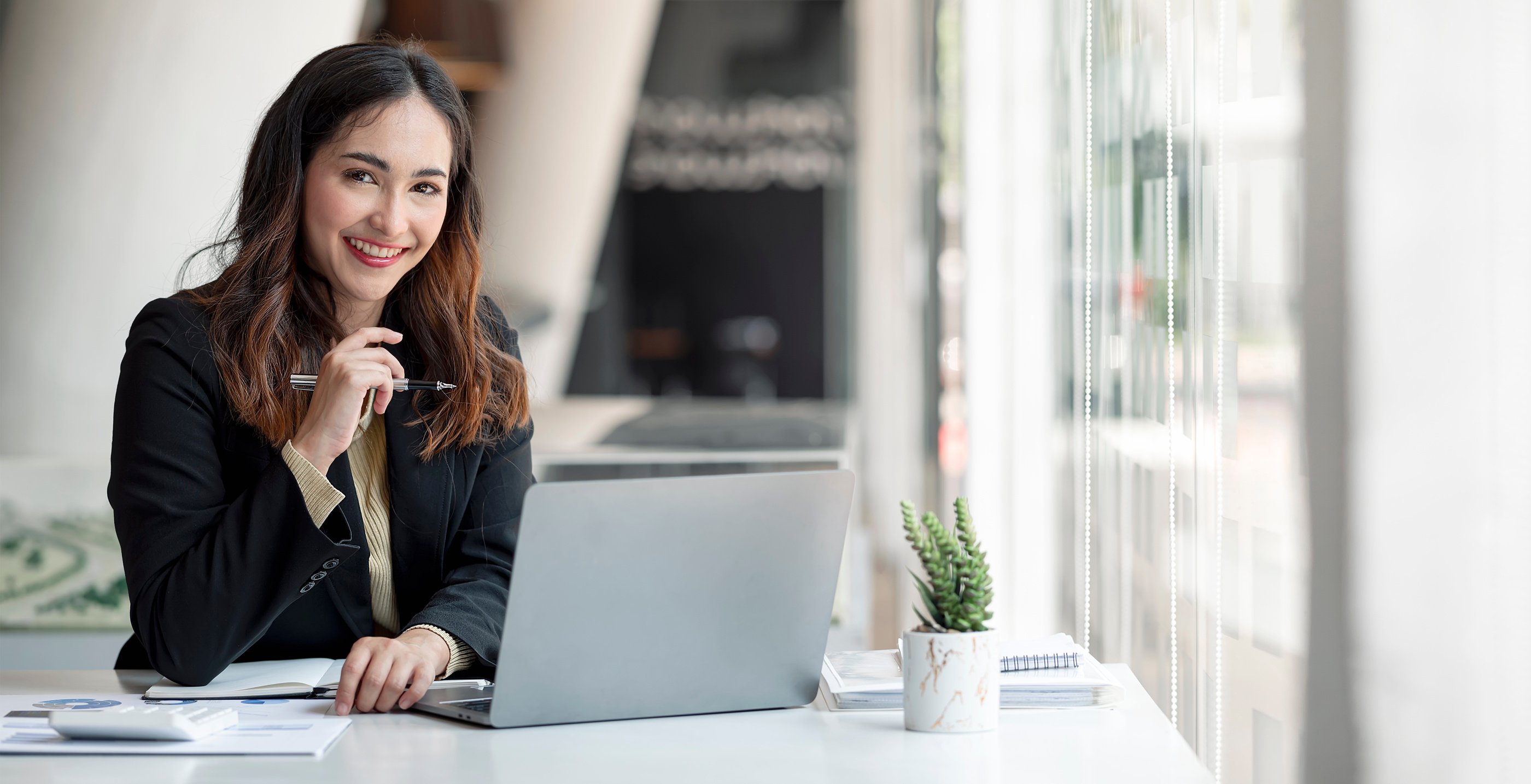 Young asian beautiful and charming busineswoman smiling